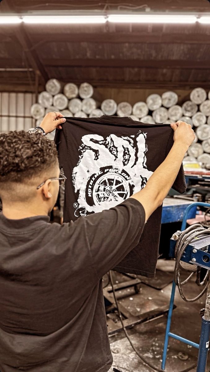 Finished screen printed tee quality check